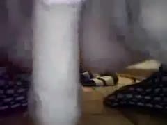 Close-up of me riding a huge plastic dong on the ground